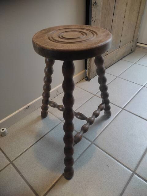 Solid wood stool with patinated varnished tripod legs