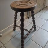 Solid wood stool with patinated varnished tripod legs