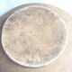 Large old salad bowl in yellow varnished earth