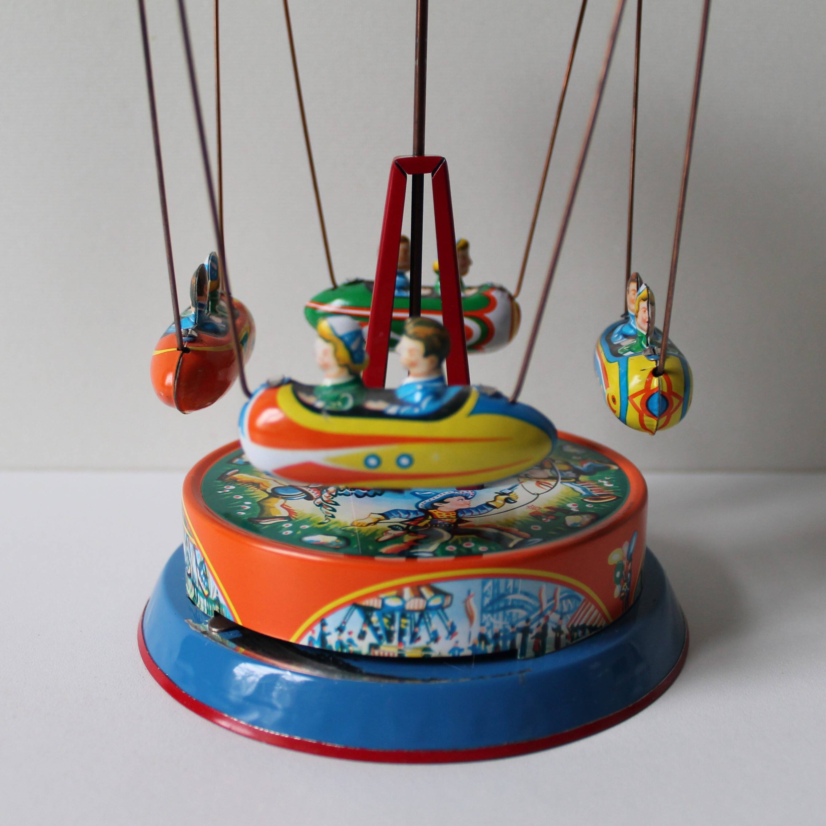 Vintage mechanical toy 'jw /germany western'/carousel