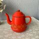 Vintage red enamelled tin teapot
