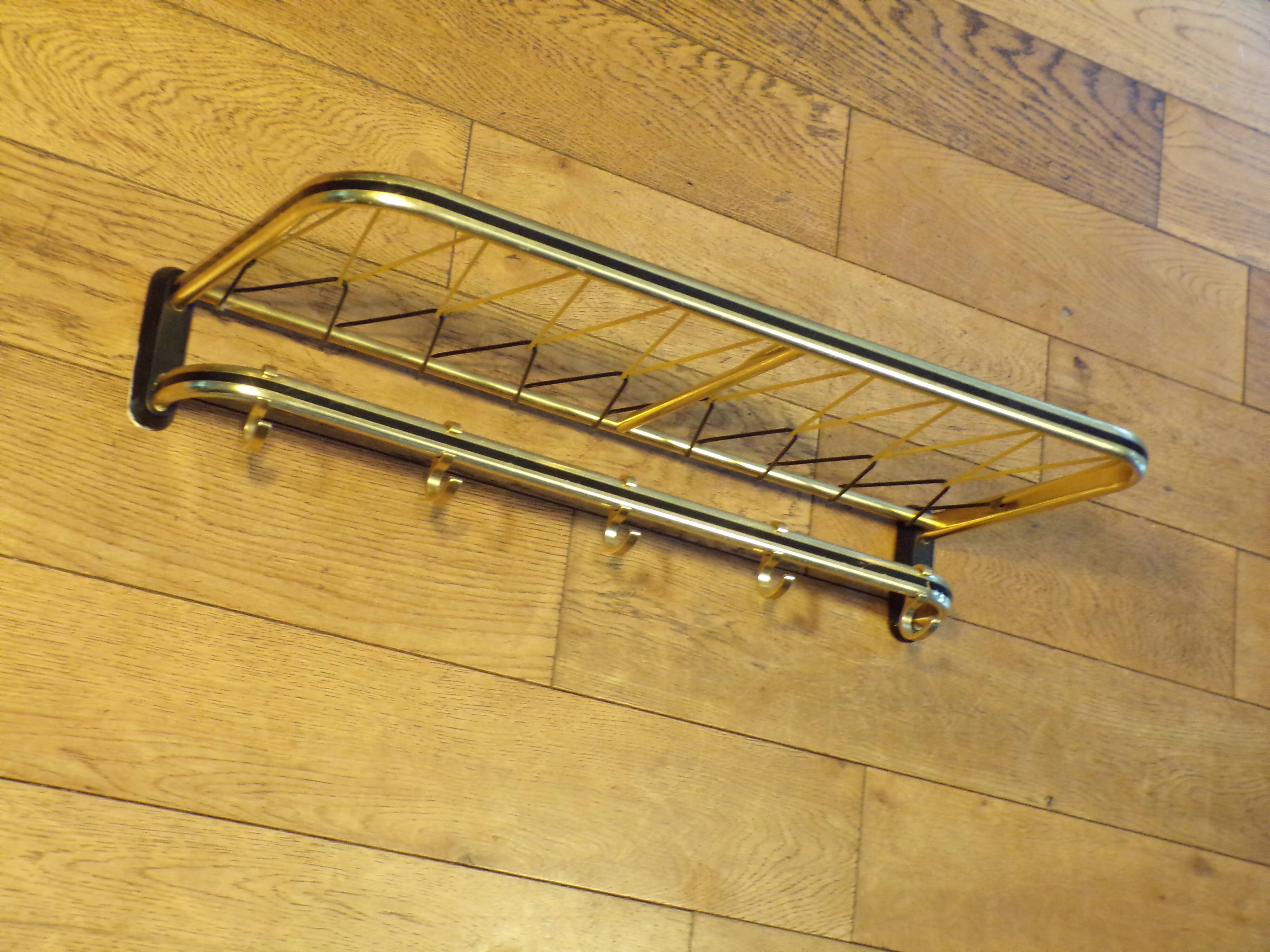 Train luggage rack style coat rack