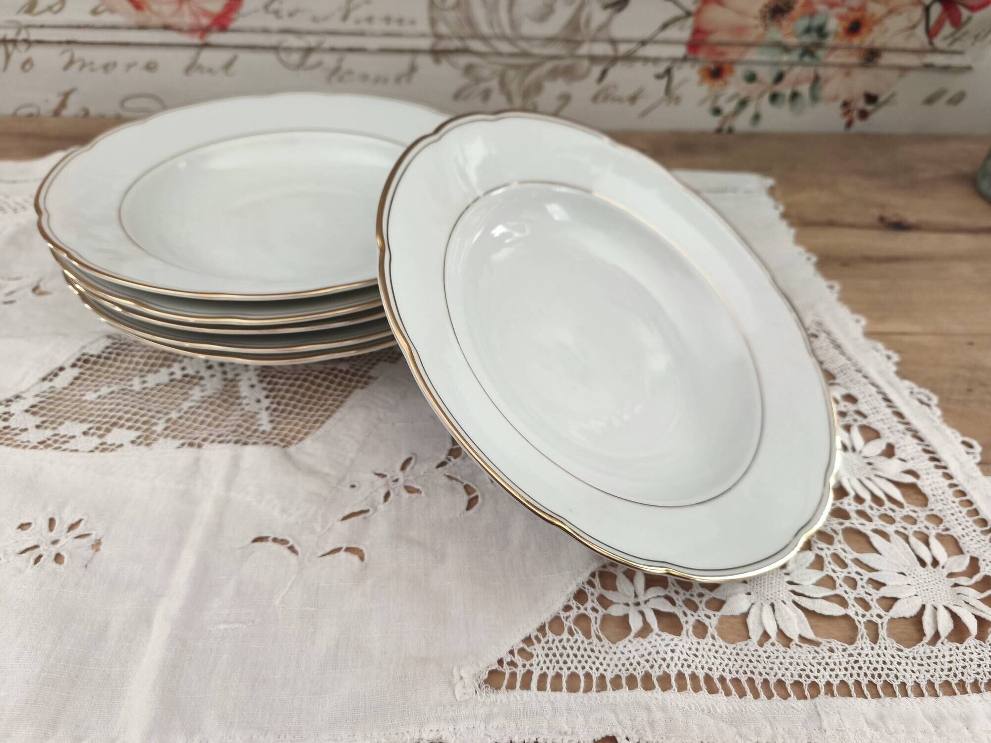 Set of 6 deep plates in fine porcelain from Bohemia with a gold rim.