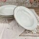 Set of 6 deep plates in fine porcelain from Bohemia with a gold rim.