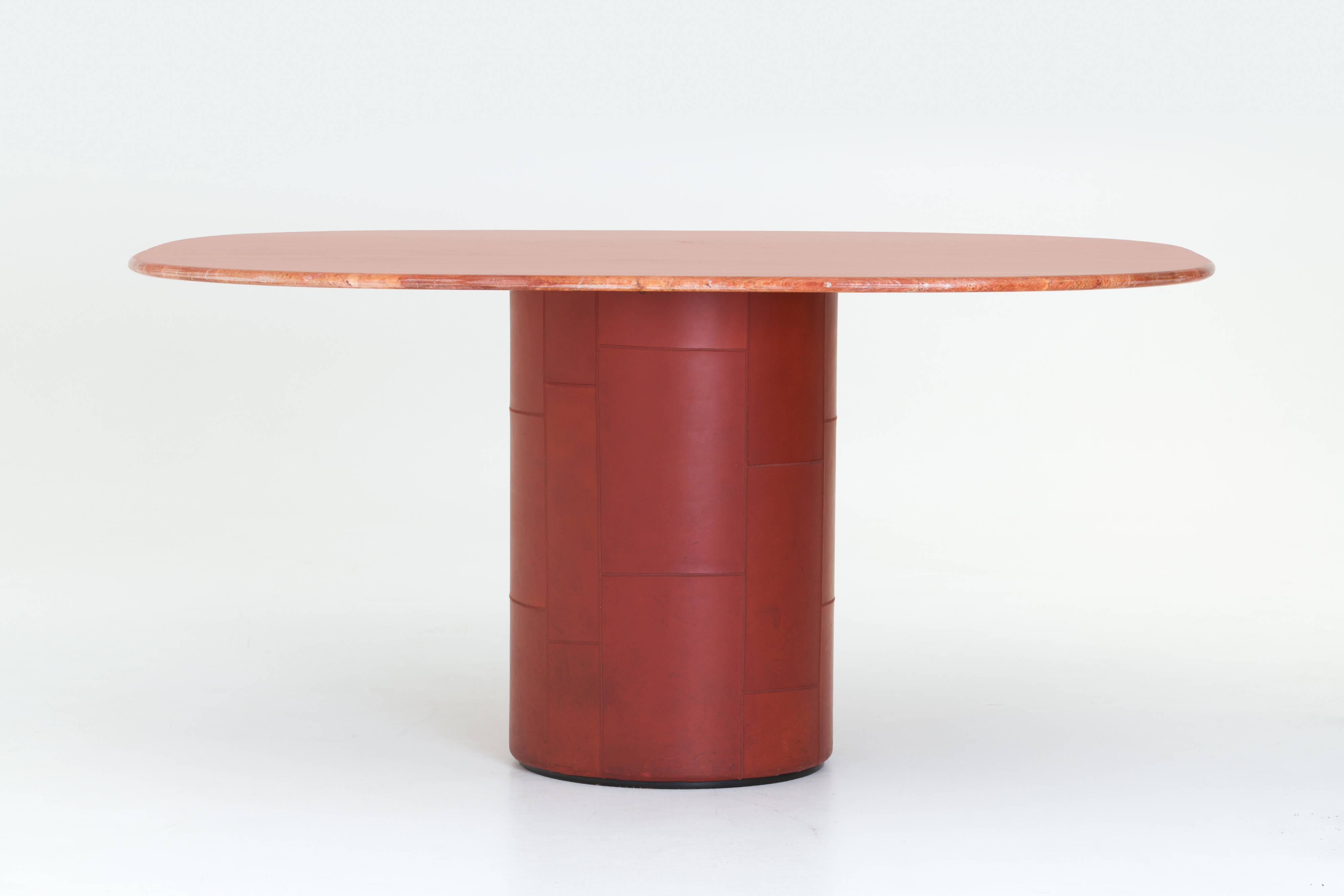 Dining table 'Tobia' in red travertine