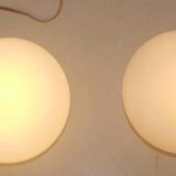 Pair of 60s wall lights in metal and opaline