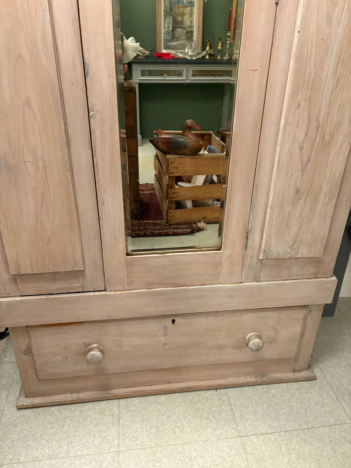 Antique English wardrobe in pale pink patina.