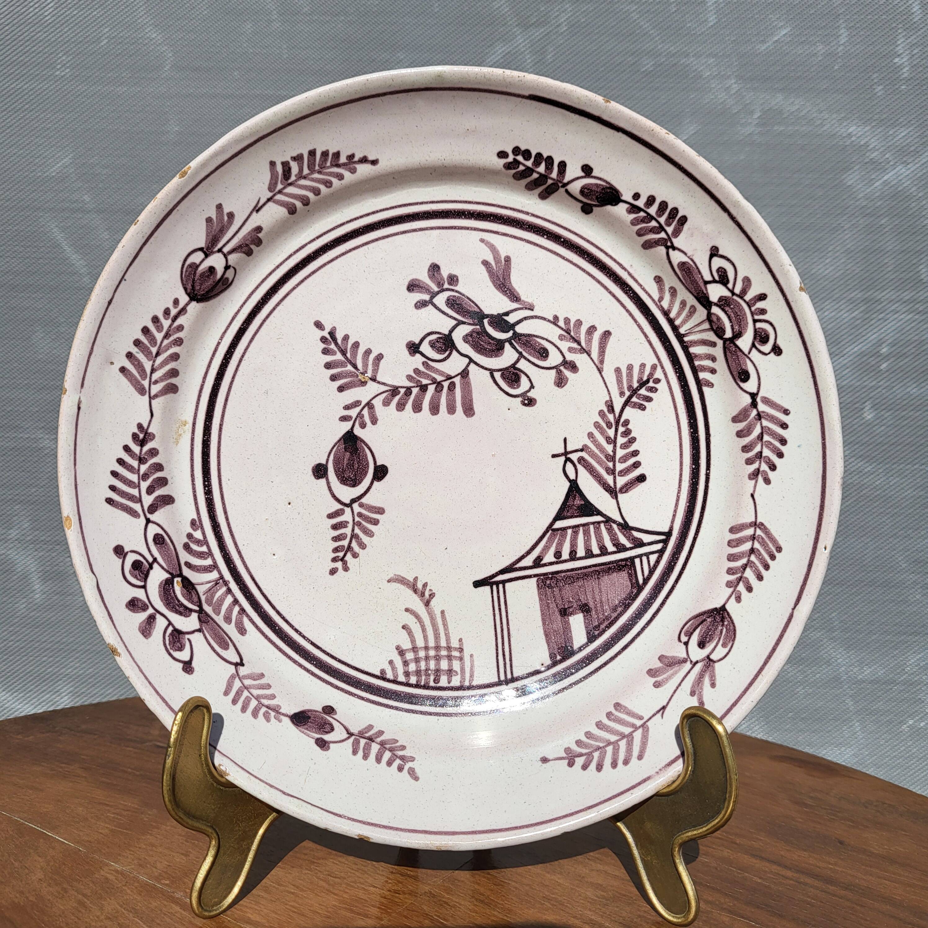 Grand Feu earthenware plate, Manganese decoration - 18th century