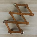 Extendable wall coat rack