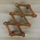 Extendable wall coat rack