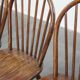 Set of 4 vintage Windsor wooden spindle chairs from the 1970s