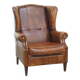 Sheepskin wingback chair in good condition