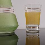 Set of 4 colored granite glasses with its carafe