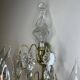19th-century wall sconce, bronze and crystal pendants.