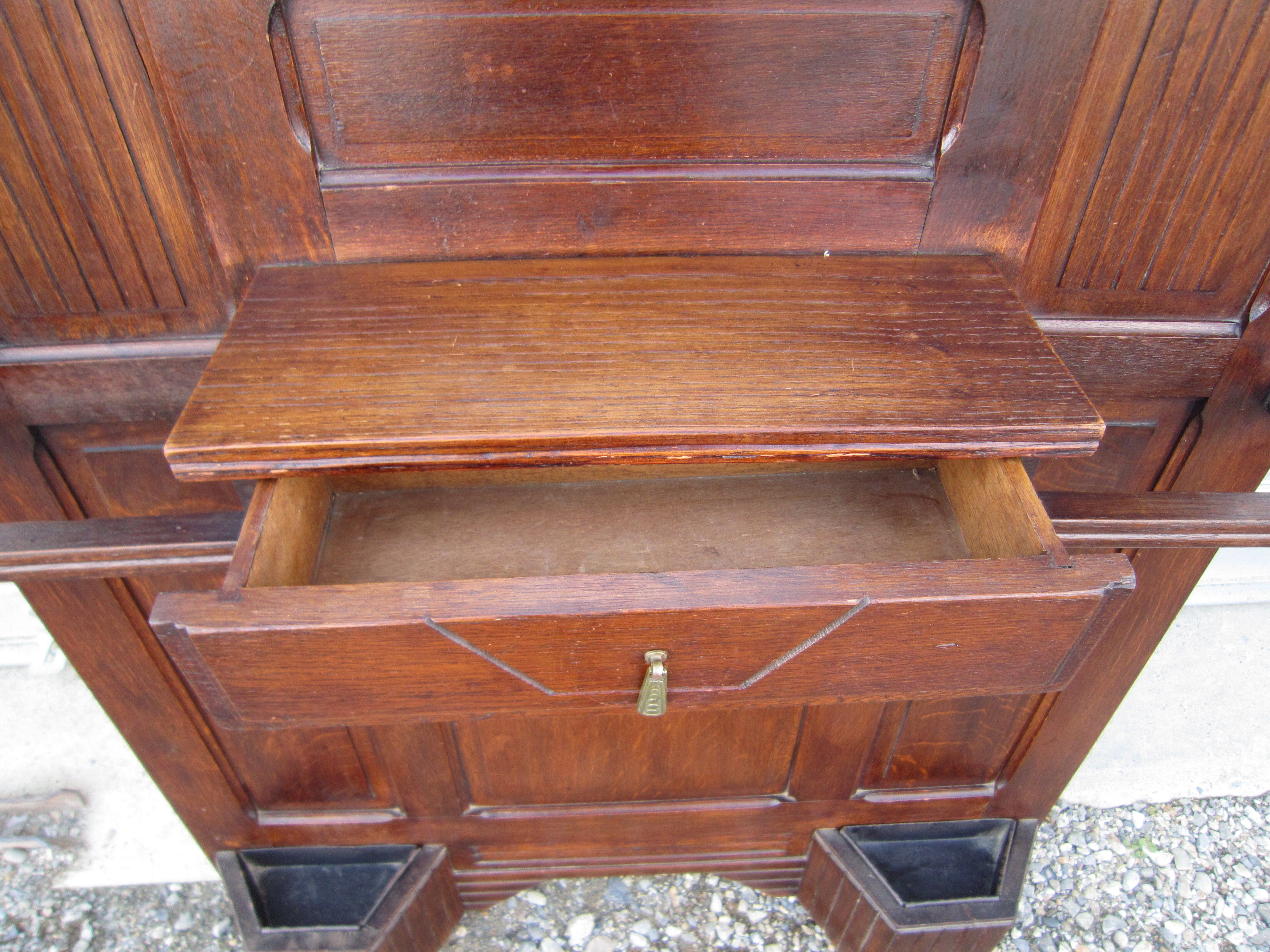 Vestiaire wears hat coat and art deco umbrella in wrought iron patere wood