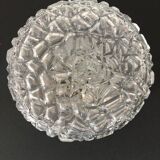 Round ceiling or wall lamp in worked glass. Gray metal support