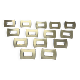 Fourteen 70s design gold steel furniture handles