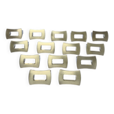 Fourteen 70s design gold steel furniture handles
