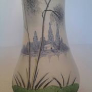 Frosted glass vase enhanced by hand