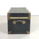 Old black trunk and brass