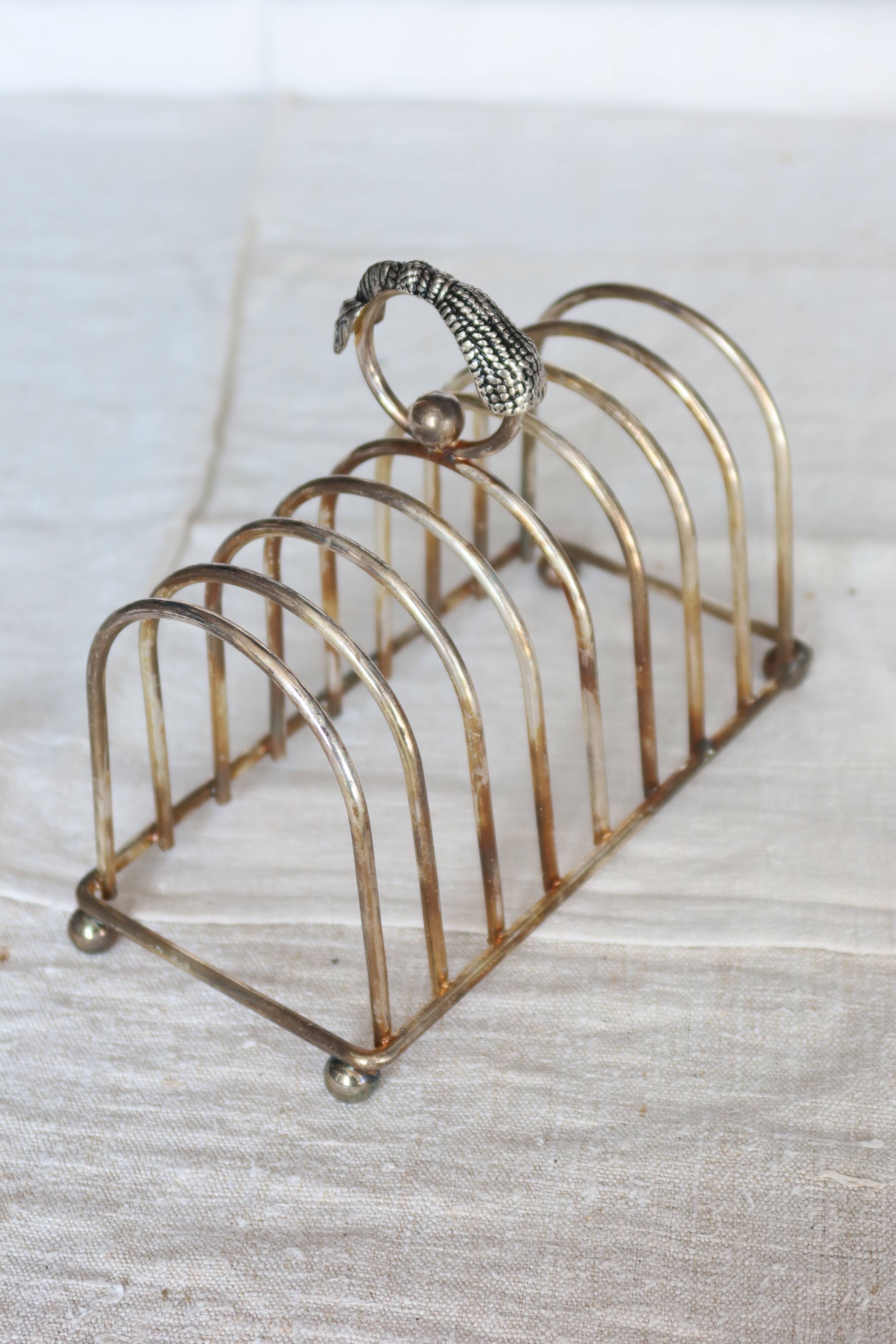Large vintage silver metal toast rack - Curtain bow detail