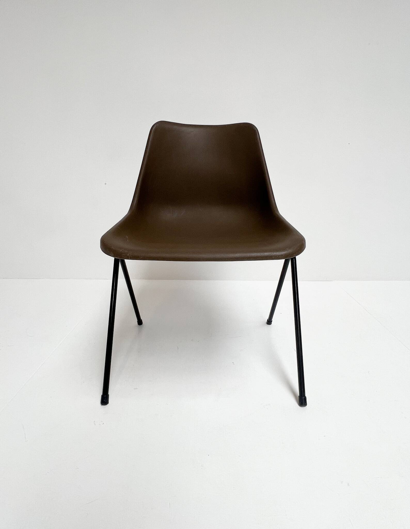 Brown and black set of 6 Polyprop chairs on a metal frame. The Polyprop cha