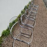 Set of 6 designer chairs in chromed metal from the 1970s