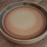 Quatre assiettes vintage en grès