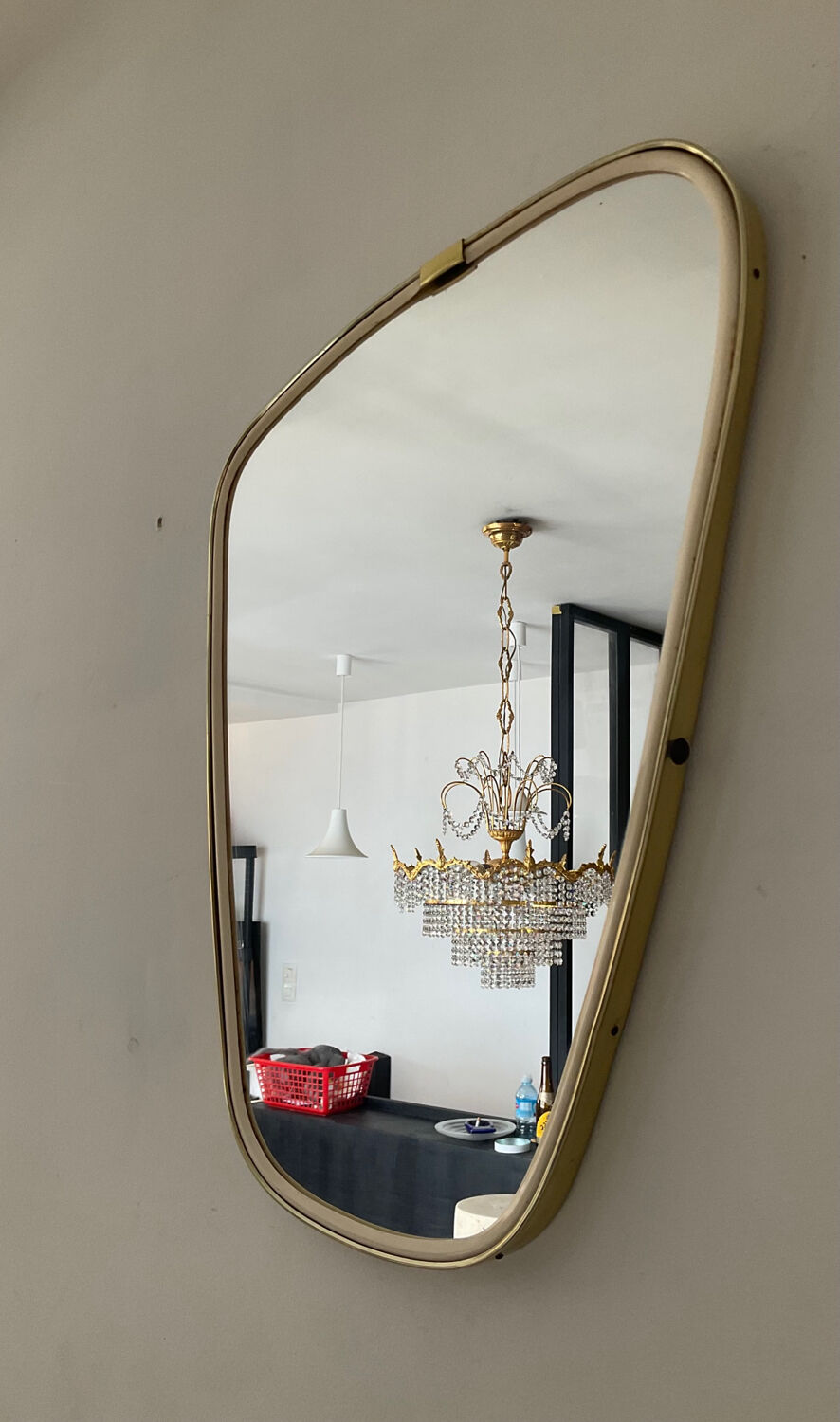 Asymmetrical mirror from the 60s freeform