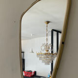 Asymmetrical mirror from the 60s freeform