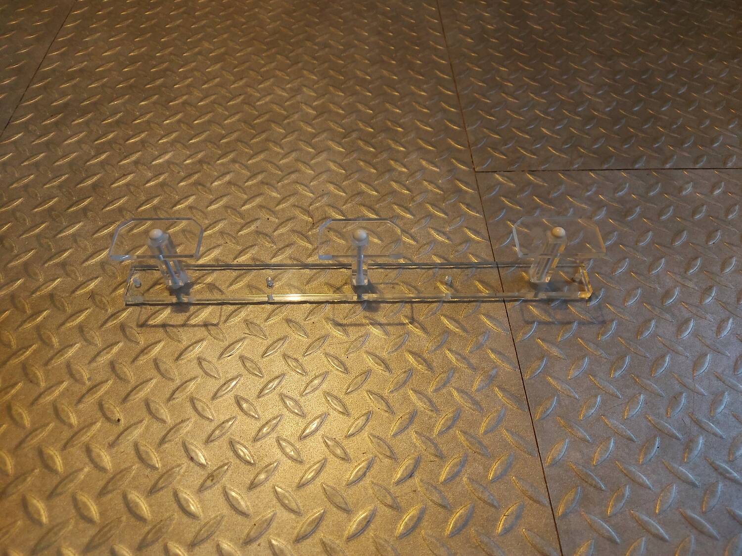 Vintage wall-mounted plexi coat rack