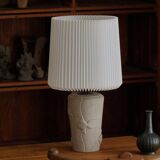 Modern vintage French table lamp, made of stone with fish patterns, 1970s.
