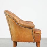 Sheepskin Chesterfield armchair with elegant design and lots of character