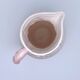 Pale pink slip decanter and colorful fruist