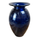 Antique cobalt blue glass vase with golden filigree.