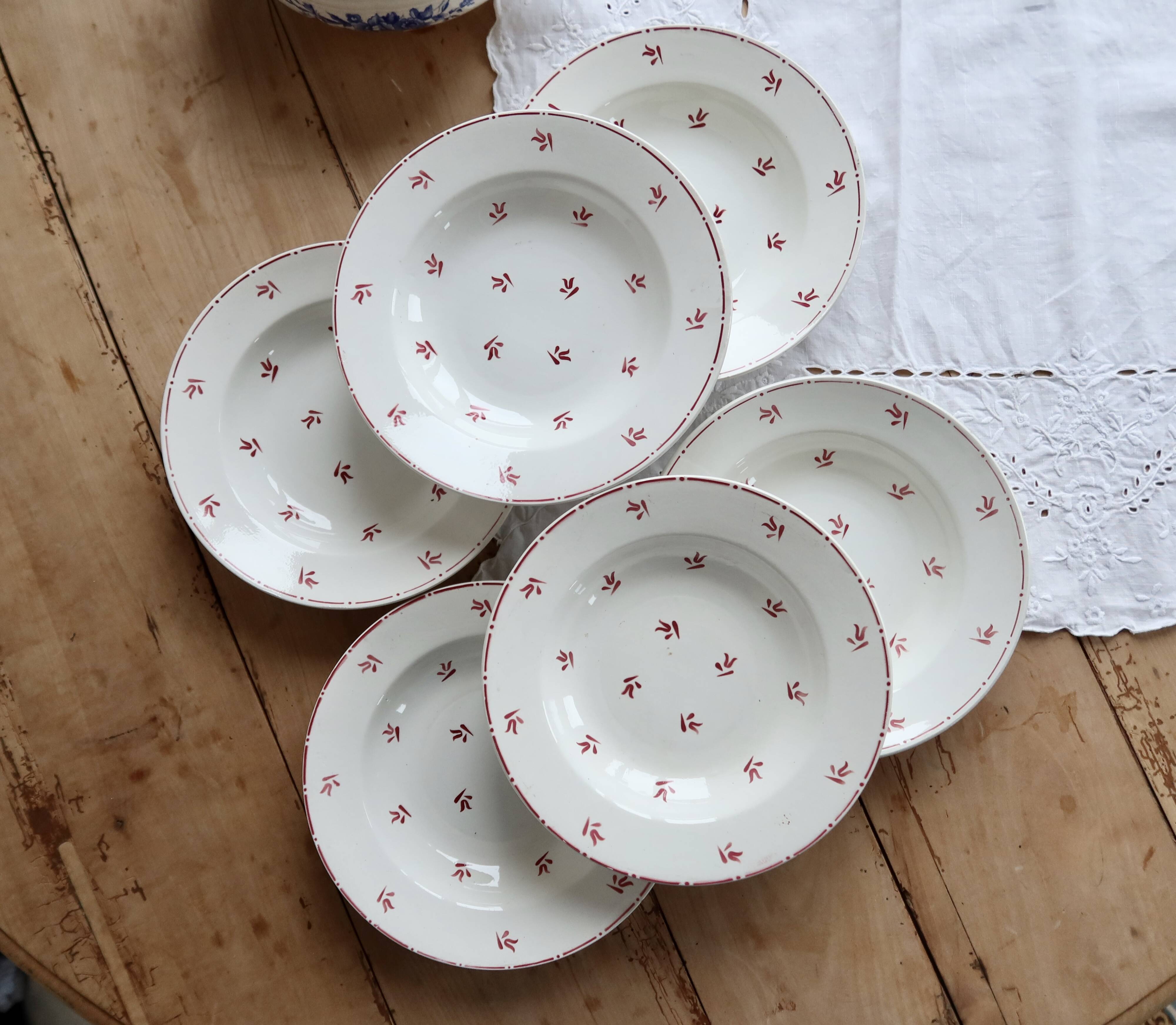 6 vintage white earthenware deep plates with red patterns