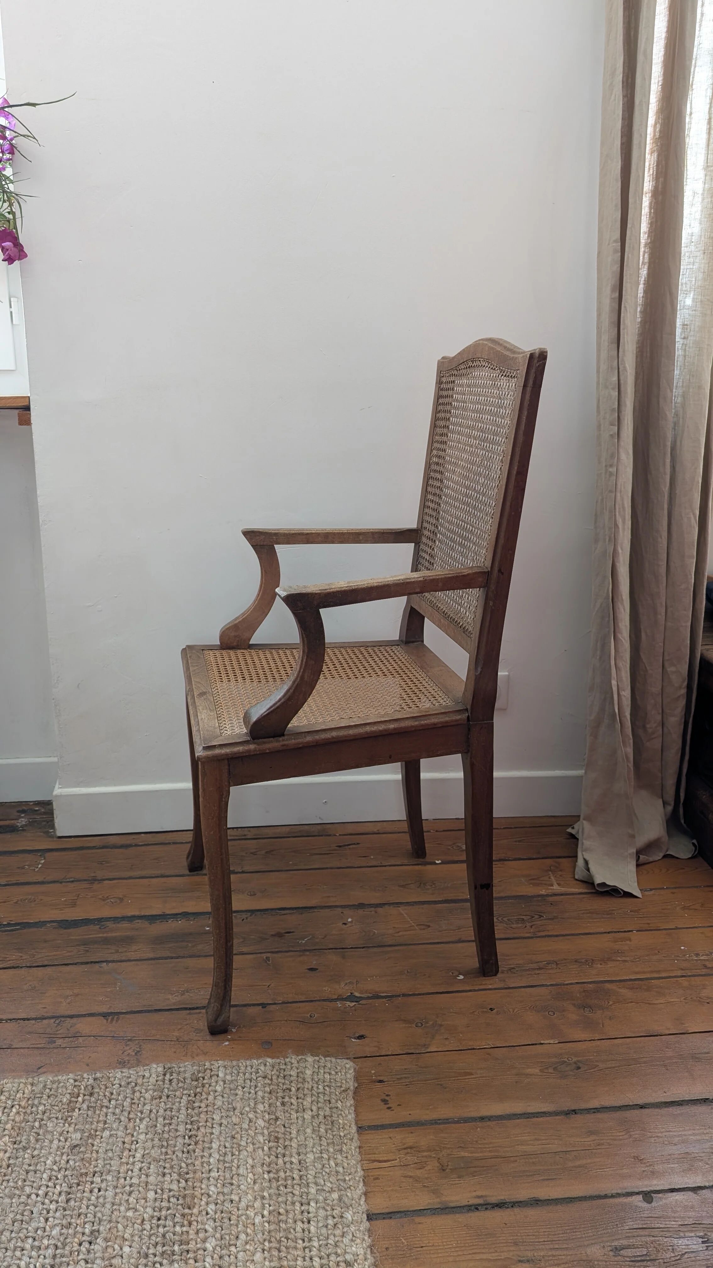 Antique Louis XVI style armchair in wood and caning