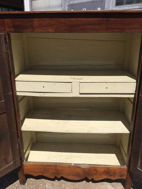 Old rustic farmhouse cabinet in fruit wood