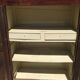 Old rustic farmhouse cabinet in fruit wood