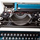 Underwood 315 blue typewriter with satchel