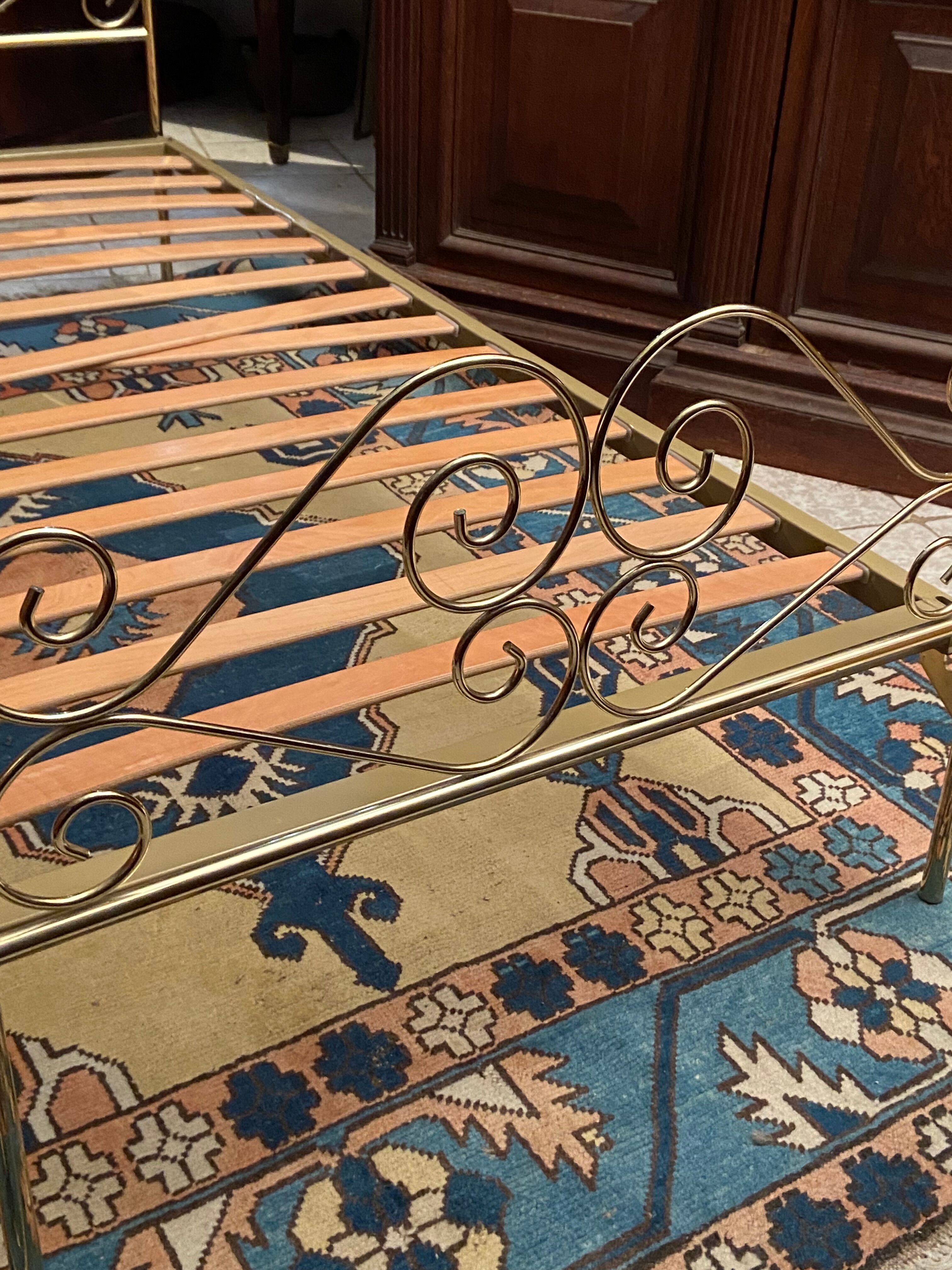 Romantic style single bed in brass with bedside table
