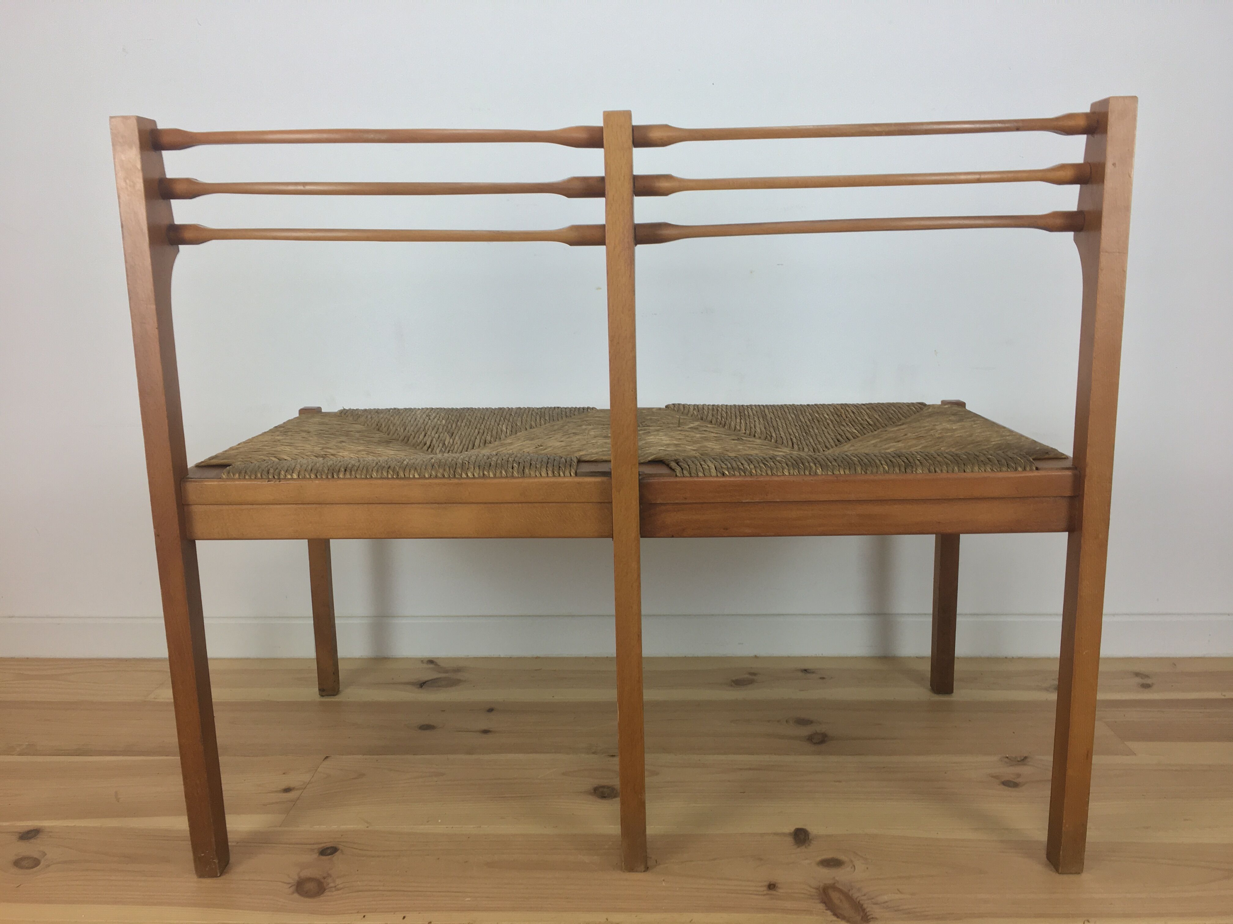 Wooden mulched modernist bench in 1950s