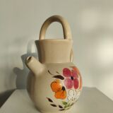 Pitcher ball in sandstone with floral pattern
