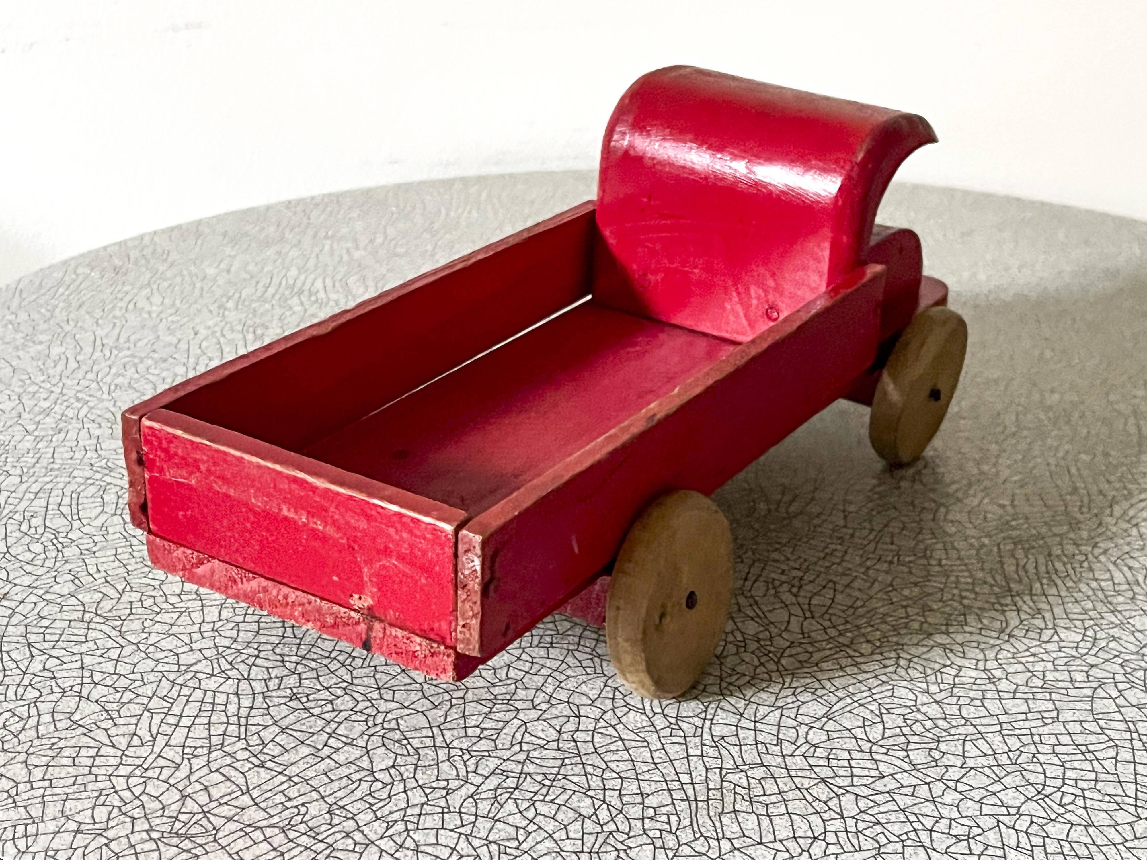 Red wooden flatbed truck, vintage toy