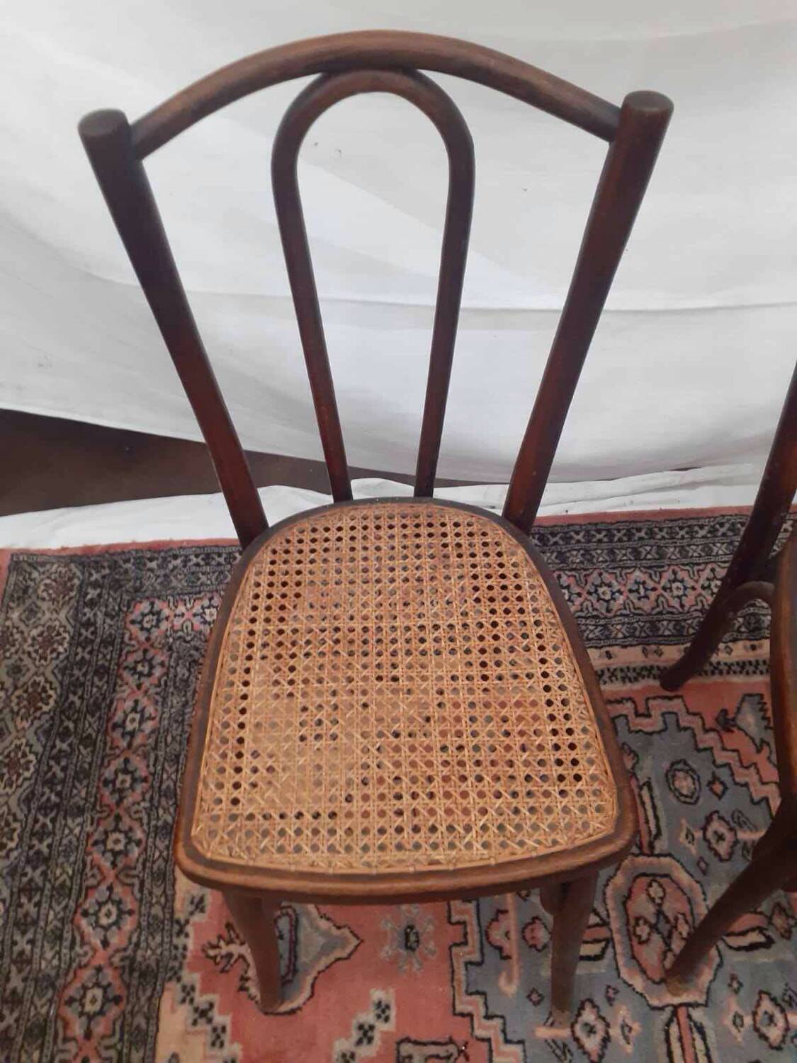 2 vintage caned bistro chairs