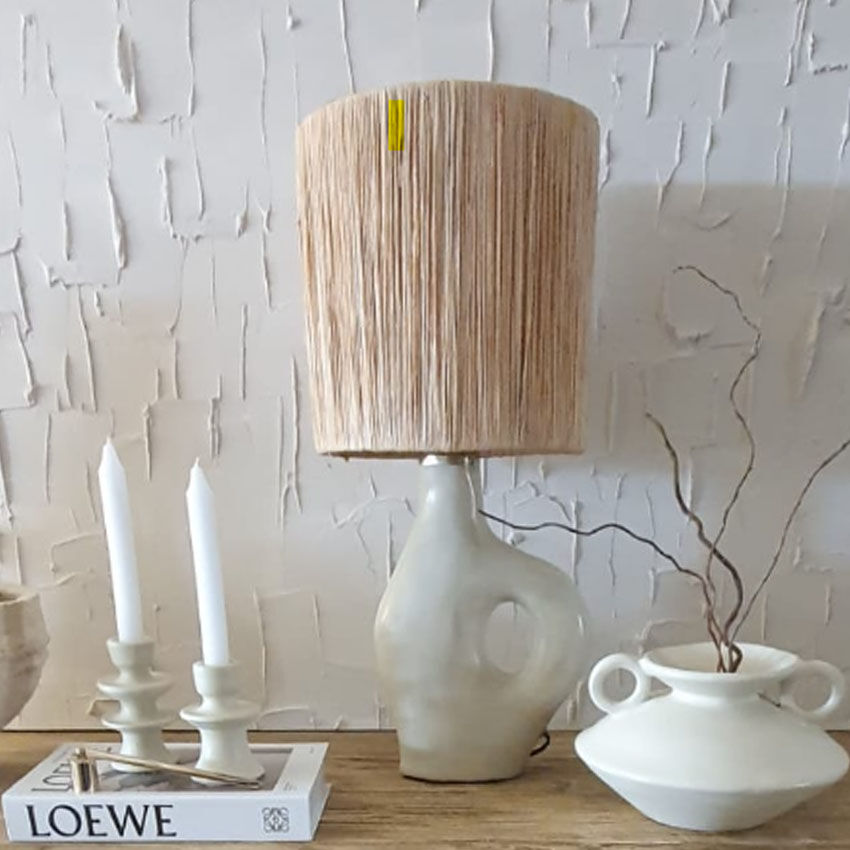 Tadelekt lamp with raffia lampshade.