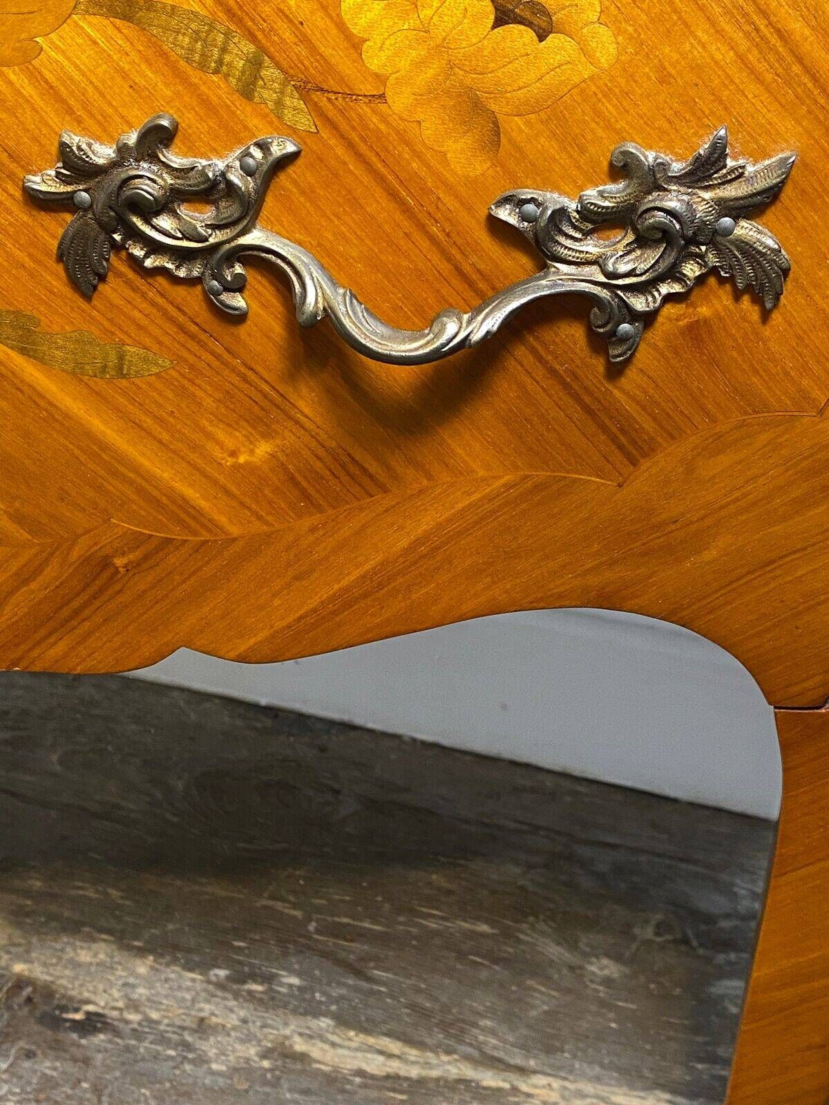 Louis XV curved commode, marble top, bronze fittings and marquetry.