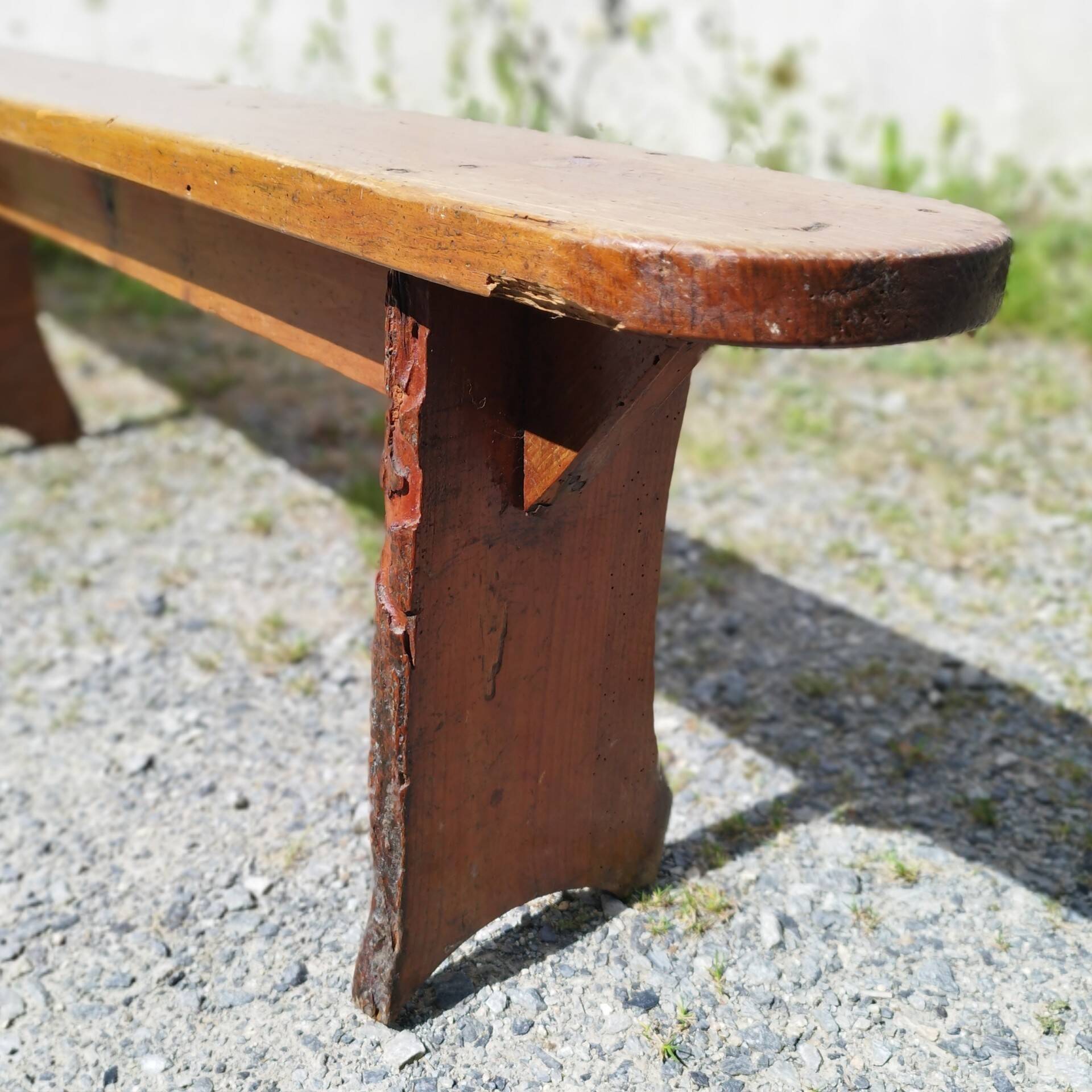 Authentic vintage farmhouse bench in varnished wood