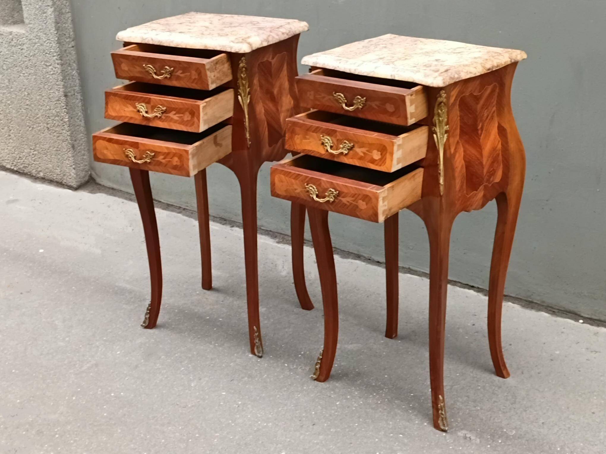 Pair of Louis XV style bedside tables in rosewood.