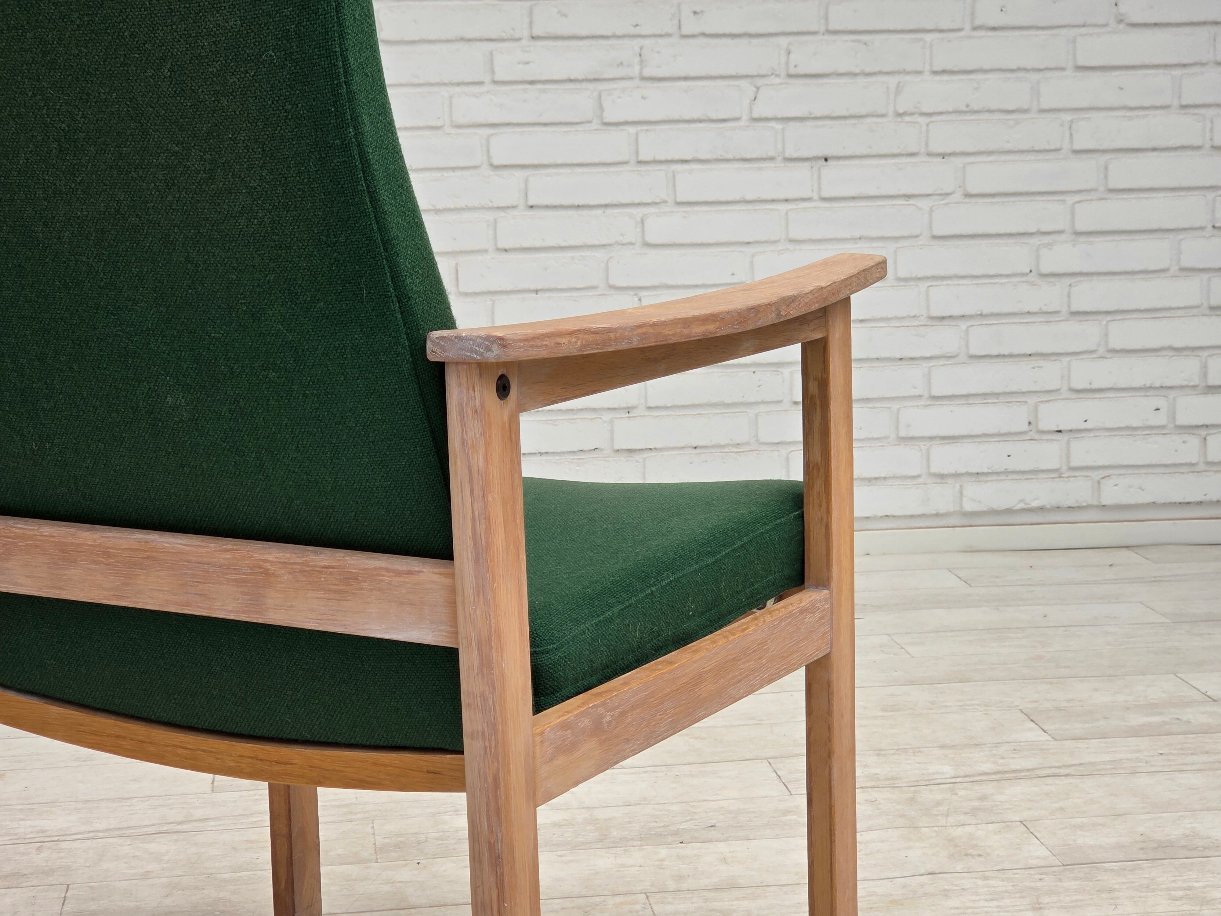 1980s, Danish armchair by Høng Stole, green furniture wool, oak wood.